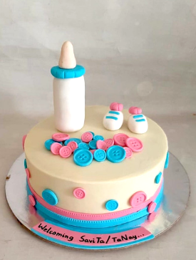 Baby Shower Cake with Bottle and Baby Shoes