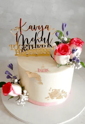 Elegant Floral Cake with edible gold leaves