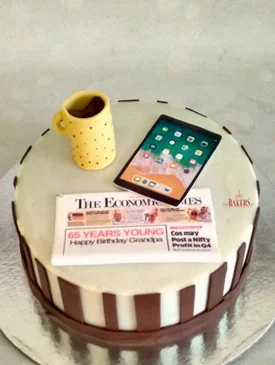 Newspaper & Tea 65th Birthday Cake