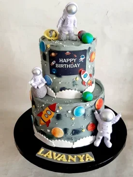 2 tier grey astronaut cake