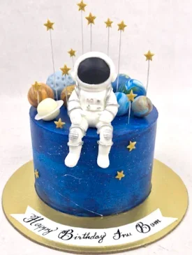 space theme figurine cake