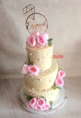 3 tier white pink engagement cake